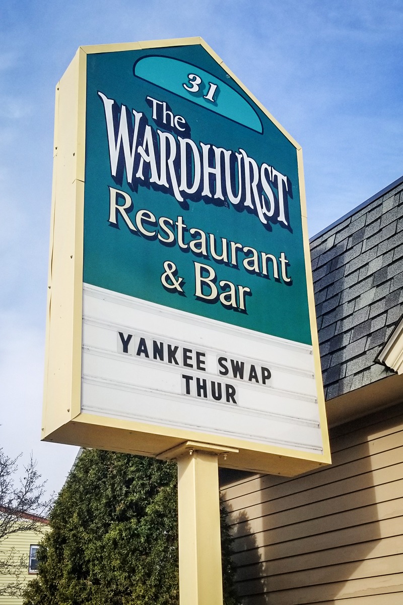 Illuminated sign for The Wardhurst Restaurant & Bar displaying "Yankee Swap THUR," showcasing custom signage designed for visibility and attracting customers.