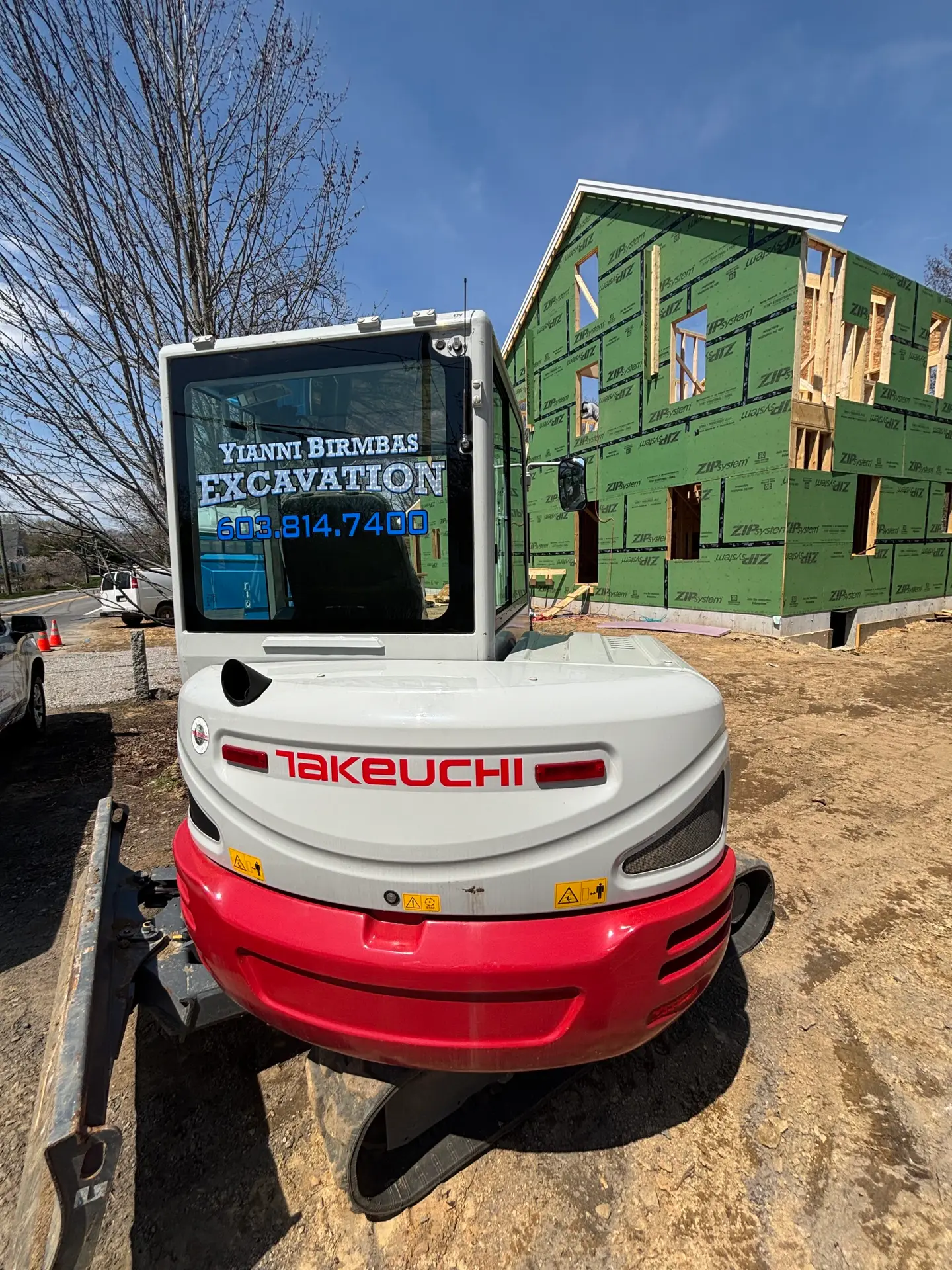 Takeuchi excavator with equipment graphics and lettering for YIANNI BIRMBAS EXCAVATION.