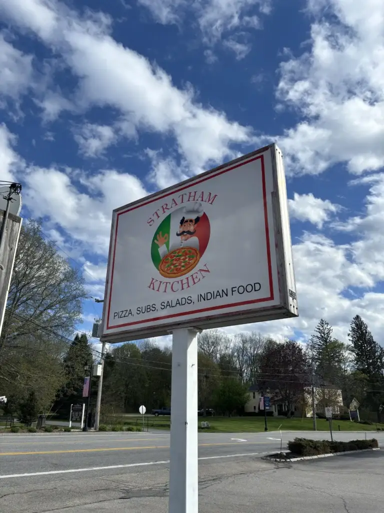 Stratton Kitchen sign illustrating commercial sign permitting and site survey considerations in Kingston, NH.